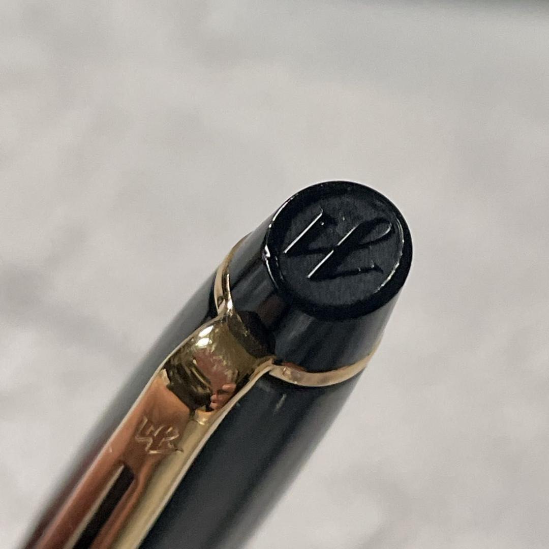 Close-up of a Waterman Fountain Pen with a sleek black body and silver accents