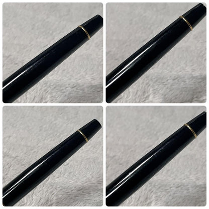 Close-up of a Waterman Fountain Pen with a sleek black body and silver accents