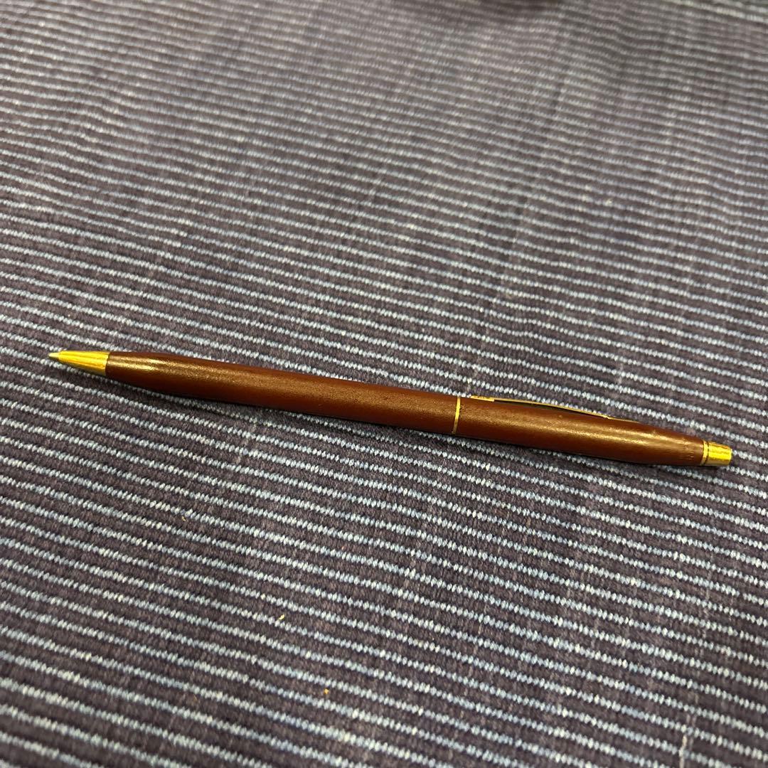 Cross ballpoint pen in wine red with gold accents showing scratches as per condition