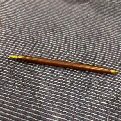 Cross ballpoint pen in wine red with gold accents showing scratches as per condition