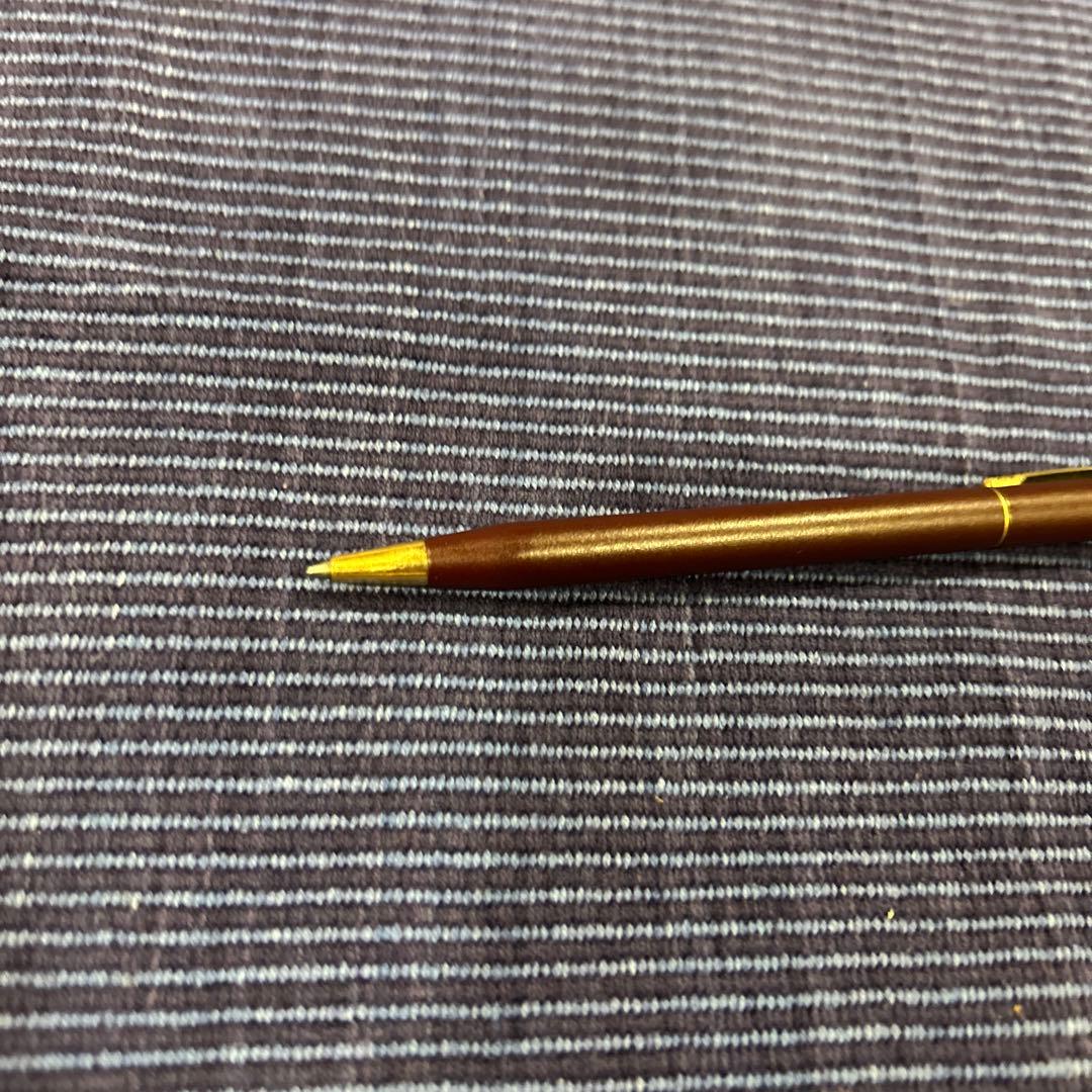 Cross ballpoint pen in wine red with gold accents showing scratches as per condition