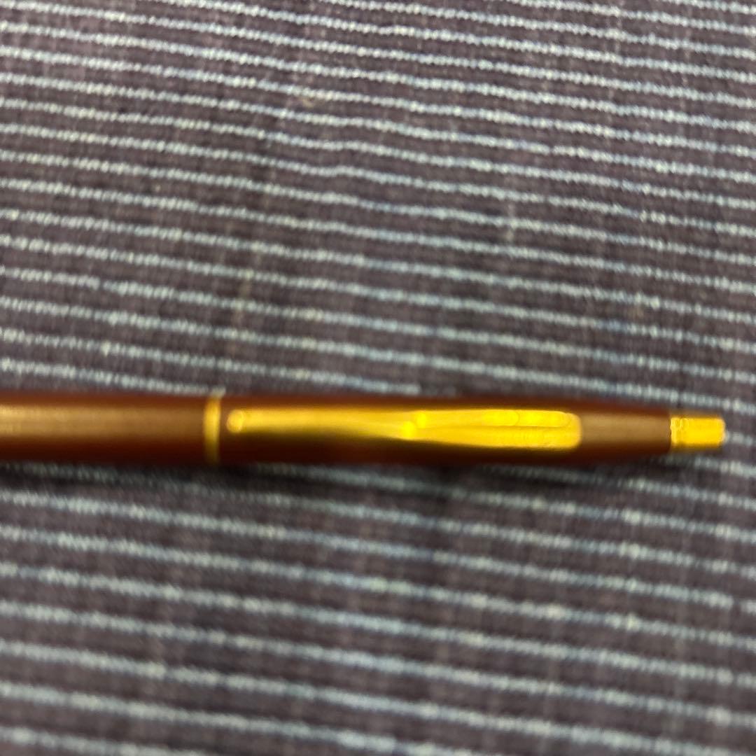 Cross ballpoint pen in wine red with gold accents showing scratches as per condition