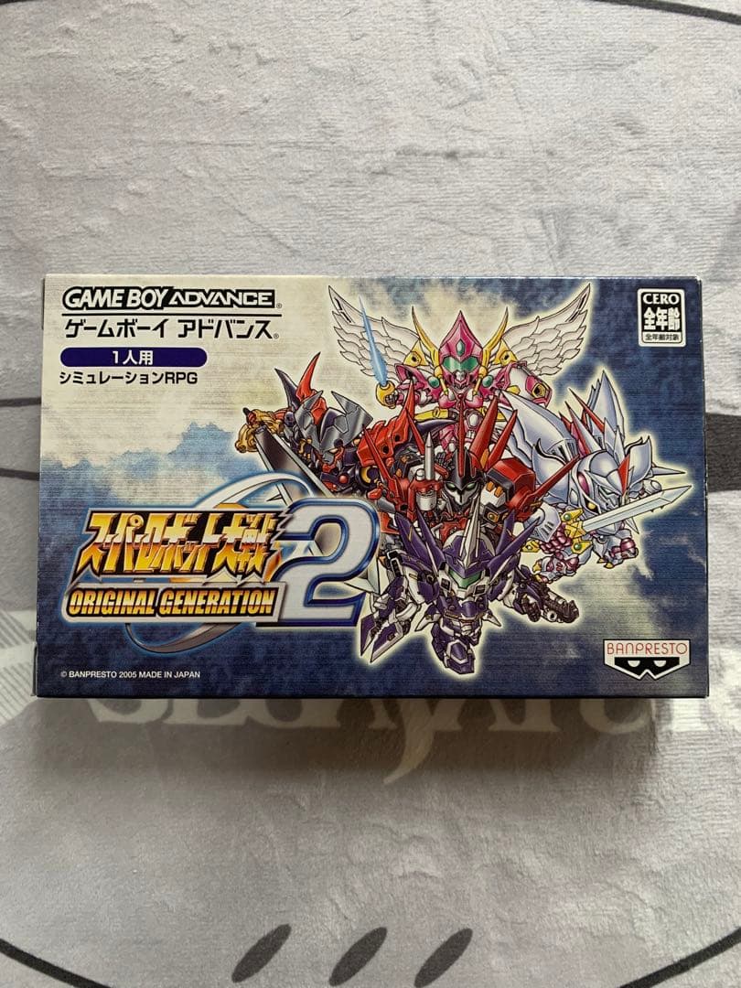 GBA Super Robot Wars 6-piece series pack showing cartridges, box, and manuals