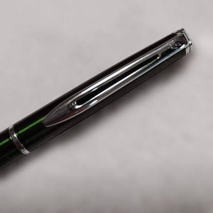 Waterman Metropolitan ballpoint pen in dark green metal with double loop clip and two additional refills