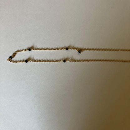 Agete black diamond necklace with delicate chain and single black diamond pendant