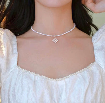 Law Akoya pearl pendant with square baby pearl and Vichy detail in 18K yellow gold, approximately 13mm size