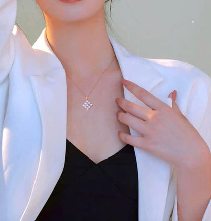 Law Akoya pearl pendant with square baby pearl and Vichy detail in 18K yellow gold, approximately 13mm size