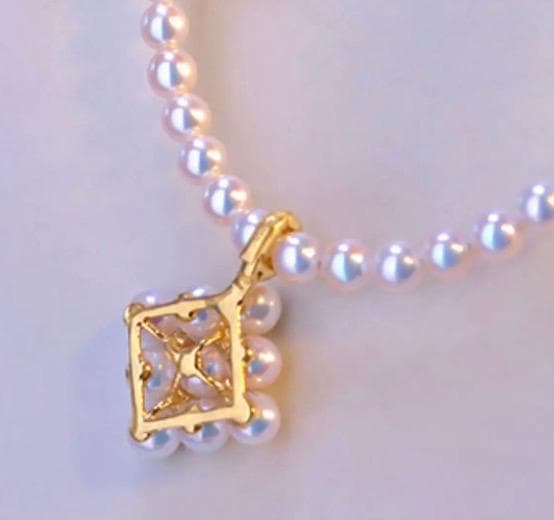 Law Akoya pearl pendant with square baby pearl and Vichy detail in 18K yellow gold, approximately 13mm size