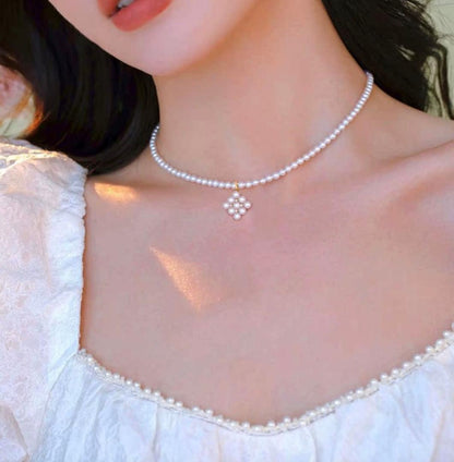 Law Akoya pearl pendant with square baby pearl and Vichy detail in 18K yellow gold, approximately 13mm size