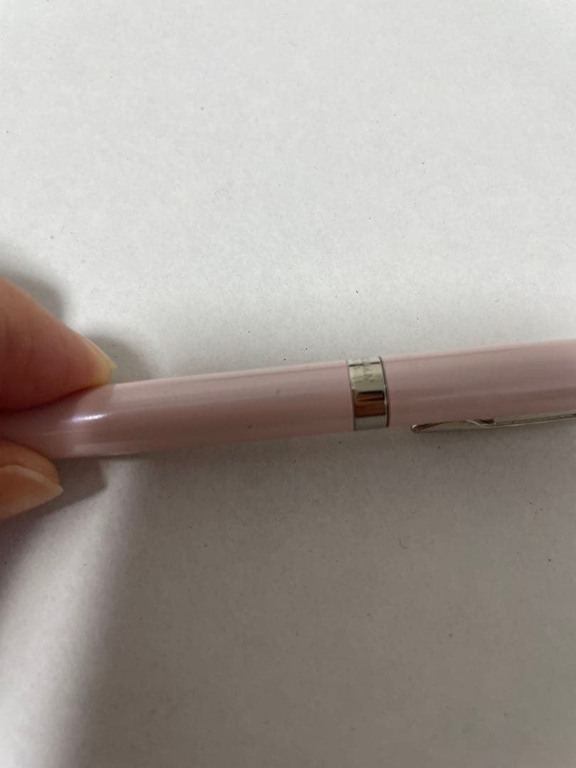 Waterman ballpoint pen in black with silver clip showing minor scratches on the body