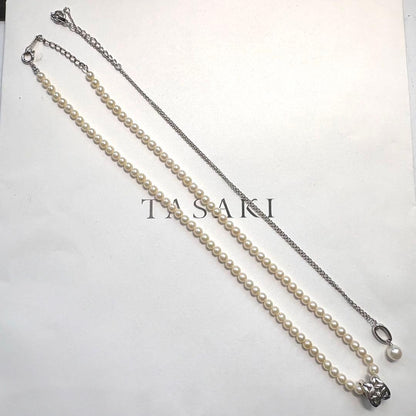 Tasaki freshwater pearl necklace with silver charm and 0.01ct diamond, adjustable length