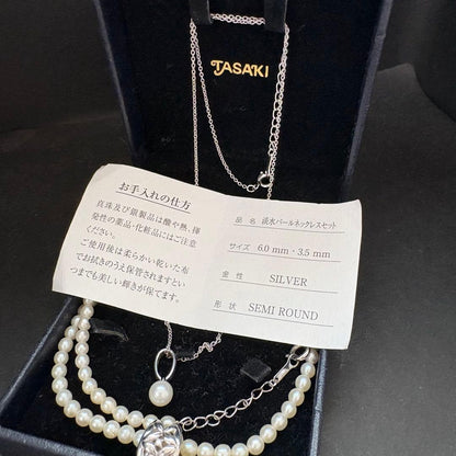 Tasaki freshwater pearl necklace with silver charm and 0.01ct diamond, adjustable length