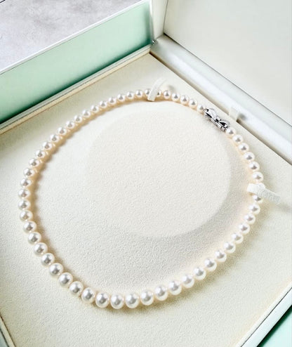 TASAKI Akoya Pearl Necklace 42cm with 7.5mm white pearls laid flat