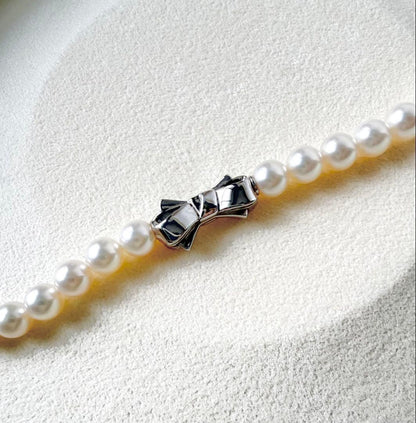 TASAKI Akoya Pearl Necklace 42cm with 7.5mm white pearls laid flat