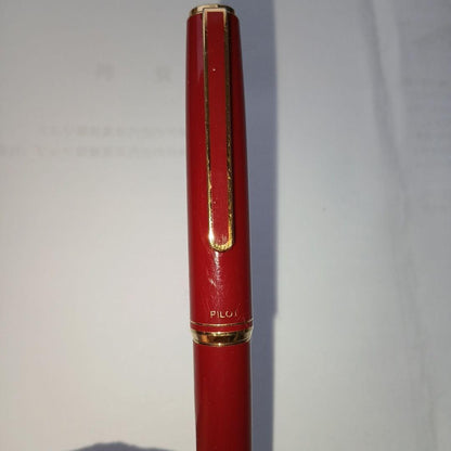 Used PILOT Fountain Pen with red body, gold trim, and gold color pen tip