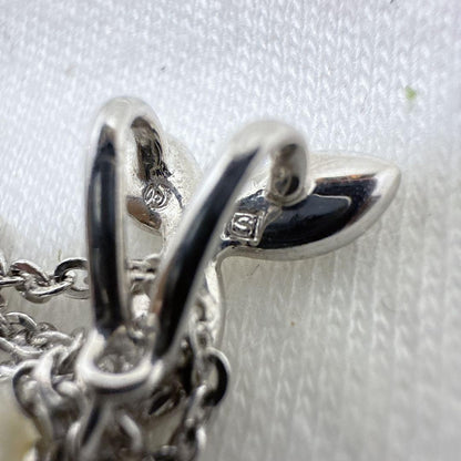 Tasaki silver necklace featuring two moving Akoya pearls on a 40 cm metal chain