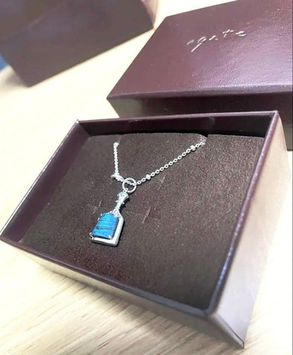 Agete Necklace with silver chain and charm, unopened and unused since June purchase
