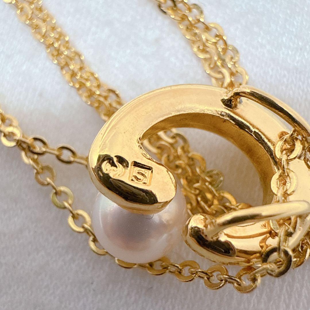Tasaki necklace with gold color, single pearl pendant on silver and metal circular chain