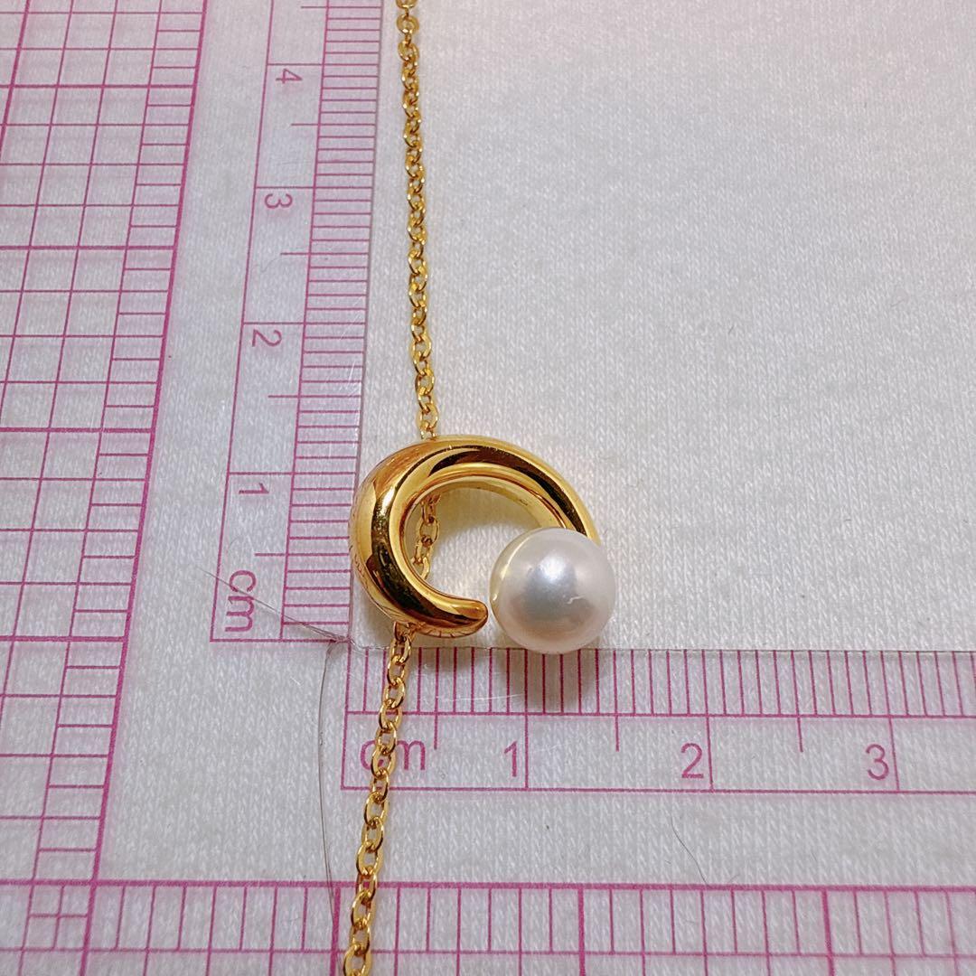 Tasaki necklace with gold color, single pearl pendant on silver and metal circular chain