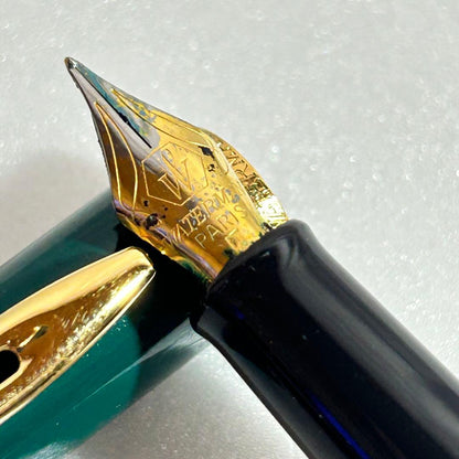 Green Waterman Metropolitan fountain pen in used condition with gold trim and cap
