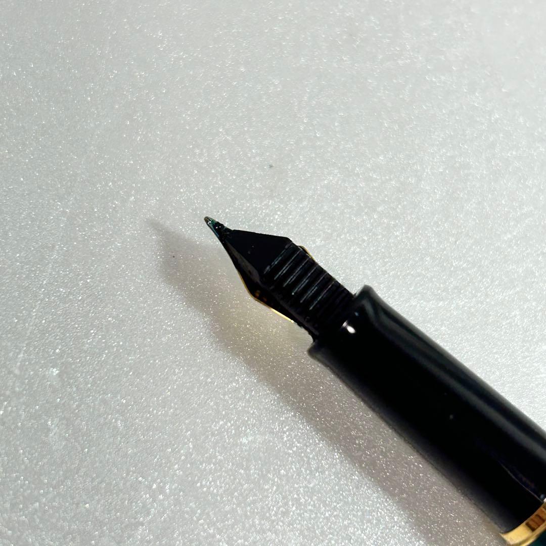 Green Waterman Metropolitan fountain pen in used condition with gold trim and cap
