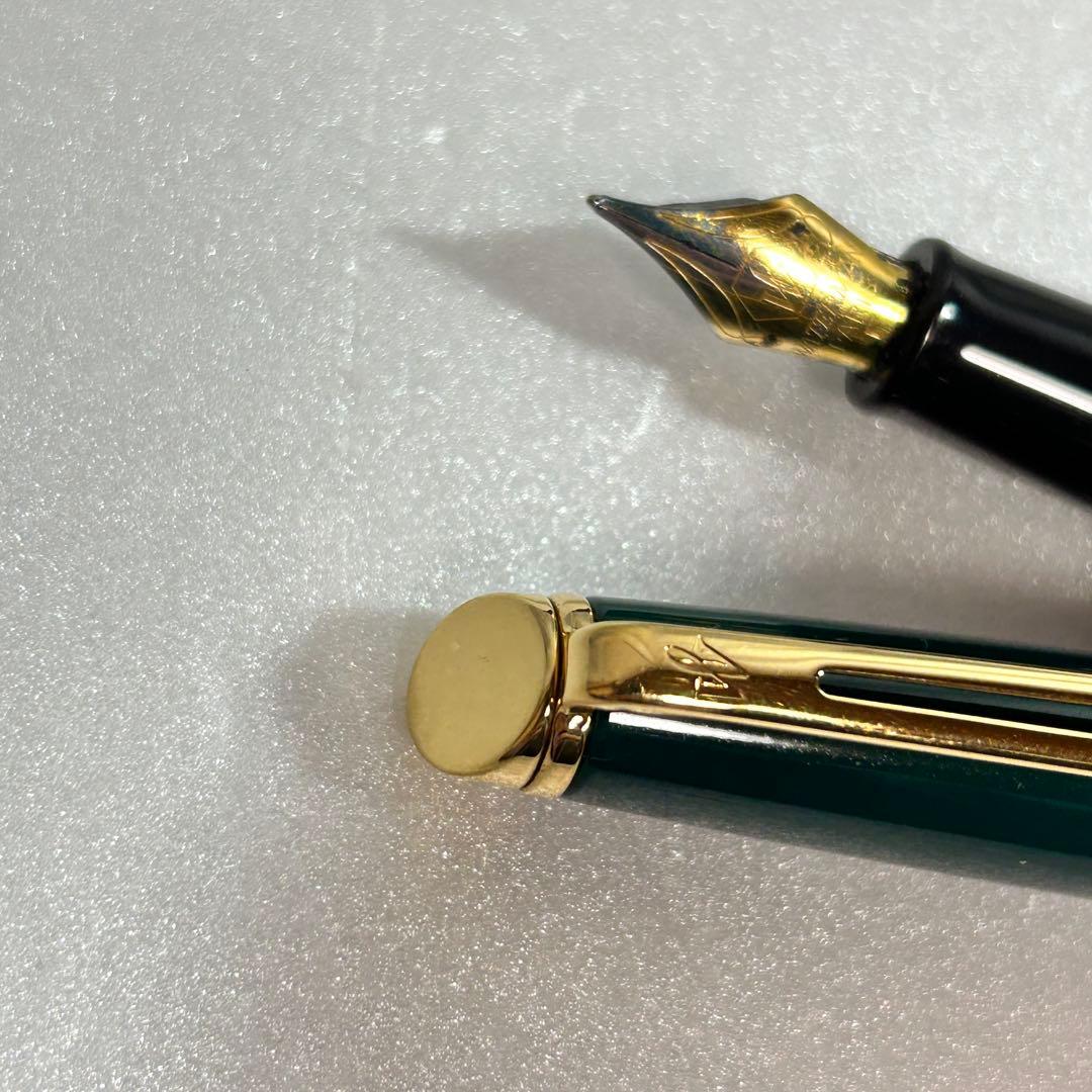 Green Waterman Metropolitan fountain pen in used condition with gold trim and cap