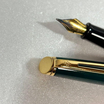 Green Waterman Metropolitan fountain pen in used condition with gold trim and cap