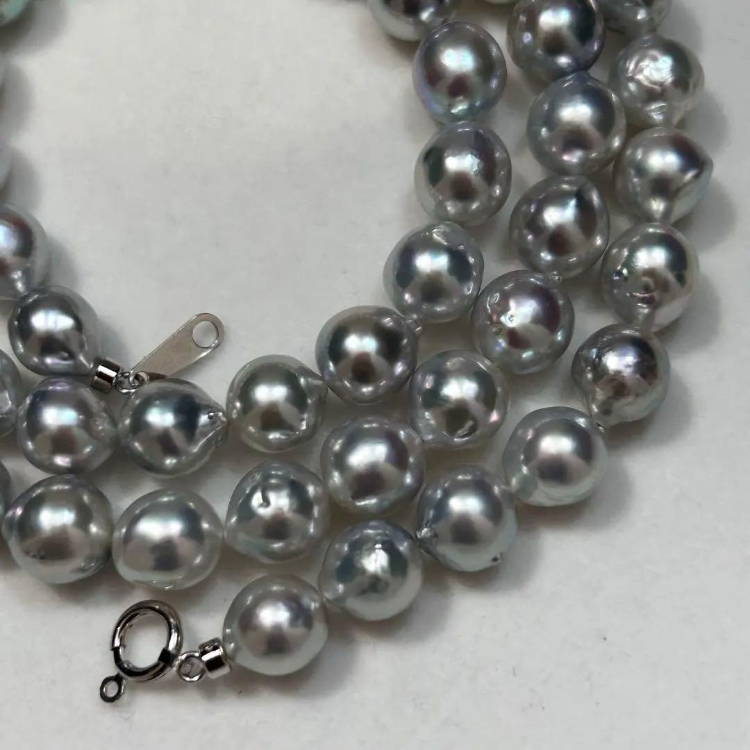 18K gold long necklace with 9mm Akoya blue pearls, 63cm length, weighing 59 grams