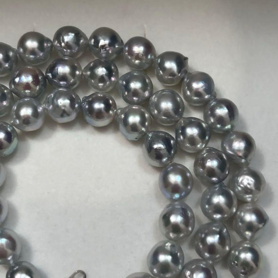 18K gold long necklace with 9mm Akoya blue pearls, 63cm length, weighing 59 grams