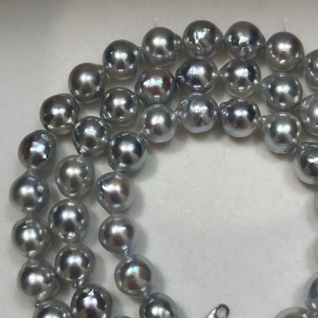 18K gold long necklace with 9mm Akoya blue pearls, 63cm length, weighing 59 grams