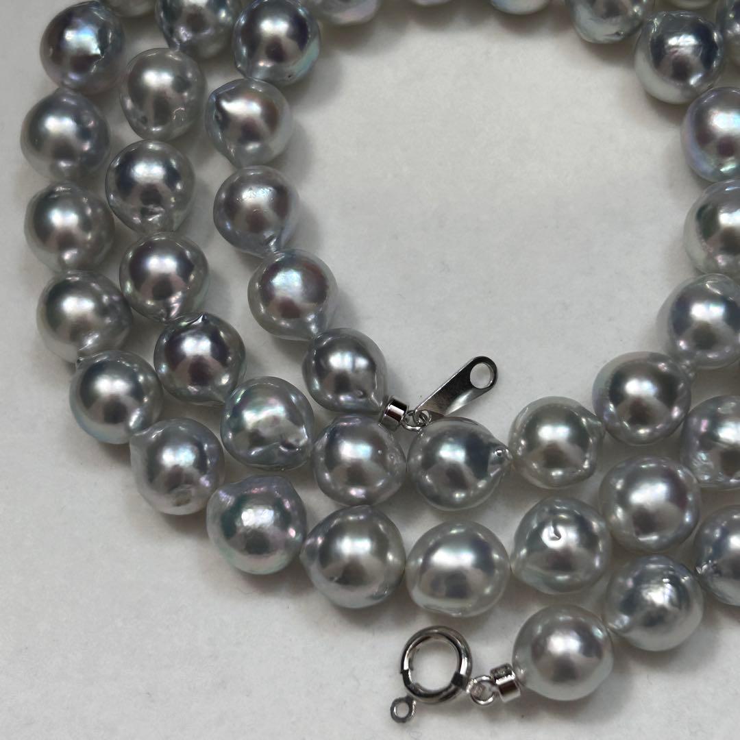 18K gold long necklace with 9mm Akoya blue pearls, 63cm length, weighing 59 grams