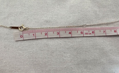 K10 Y-shaped necklace with detachable chain charm, 56 cm length, displayed on white background