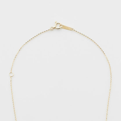 K10 Y-shaped necklace with detachable chain charm, 56 cm length, displayed on white background