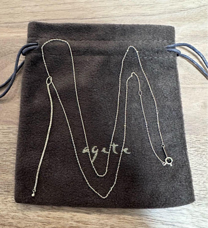 K10 Y-shaped necklace with detachable chain charm, 56 cm length, displayed on white background