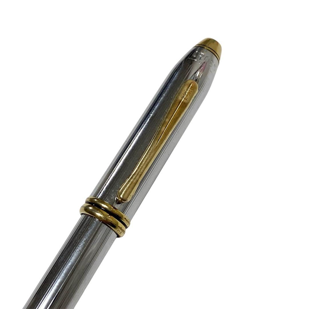 Cross vintage fountain pen with silver stainless steel body and gold cap, clip, and nib detailing