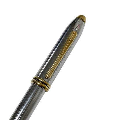Cross vintage fountain pen with silver stainless steel body and gold cap, clip, and nib detailing