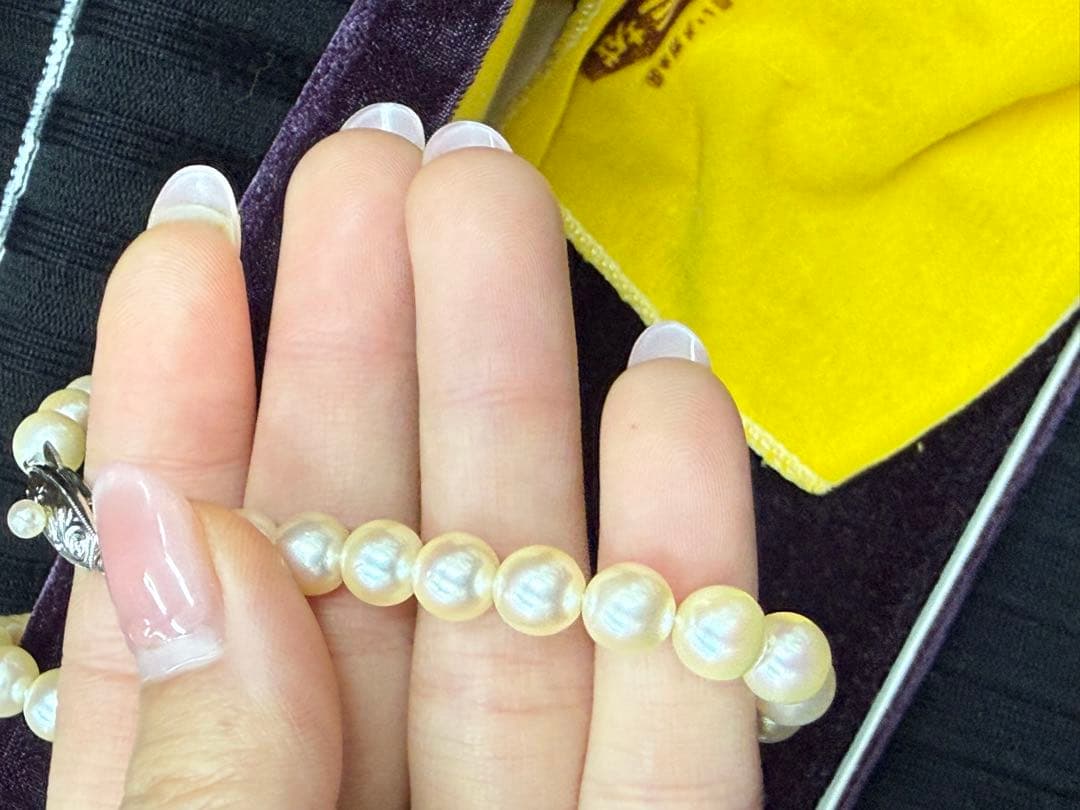 Tasaki 14-karat white gold necklace with a 7mm black pearl on a 38cm chain for ladies