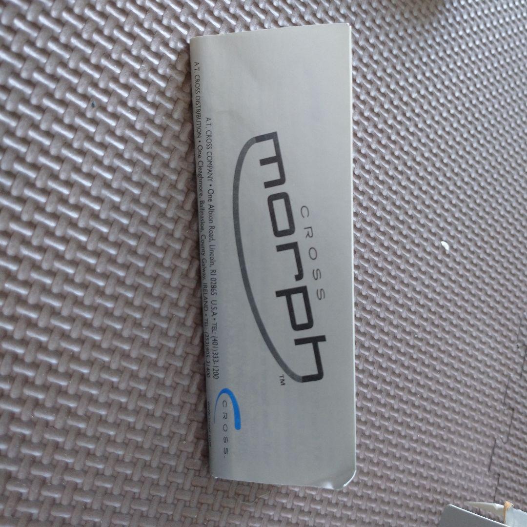 Blue Cross Morph ballpoint pen with NFL logo, metal case showing signs of age and wear