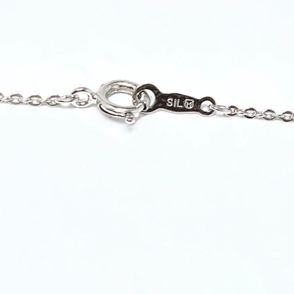 MIKIMOTO pearl necklace pendant in silver with 40.5 cm chain on white background