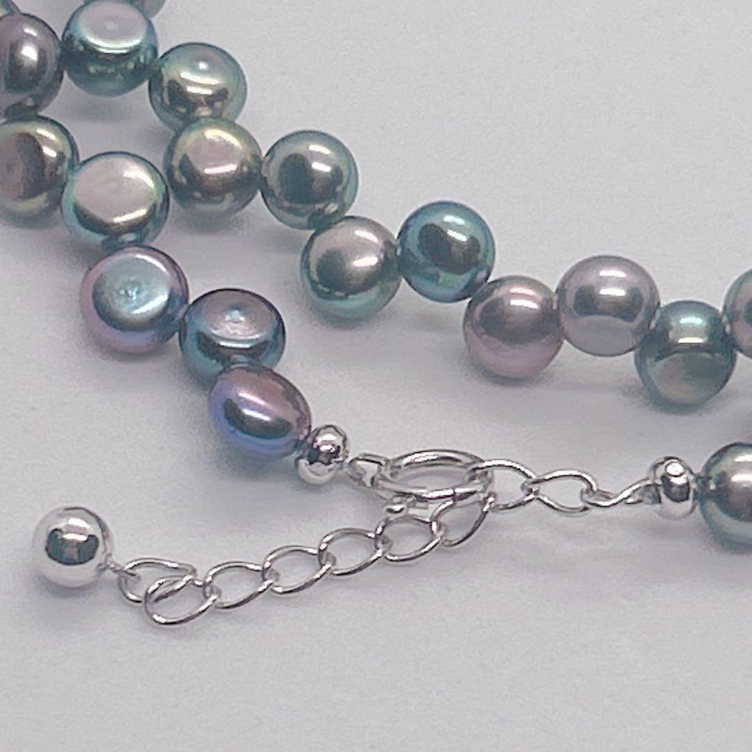 Pearl Necklace 64 featuring black aurora pearls and a K14 white gold clasp, 40cm length