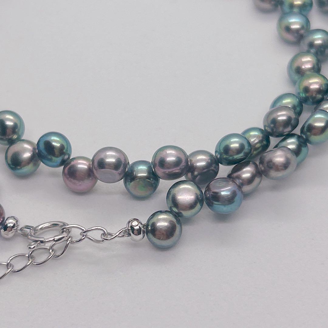 Pearl Necklace 64 featuring black aurora pearls and a K14 white gold clasp, 40cm length