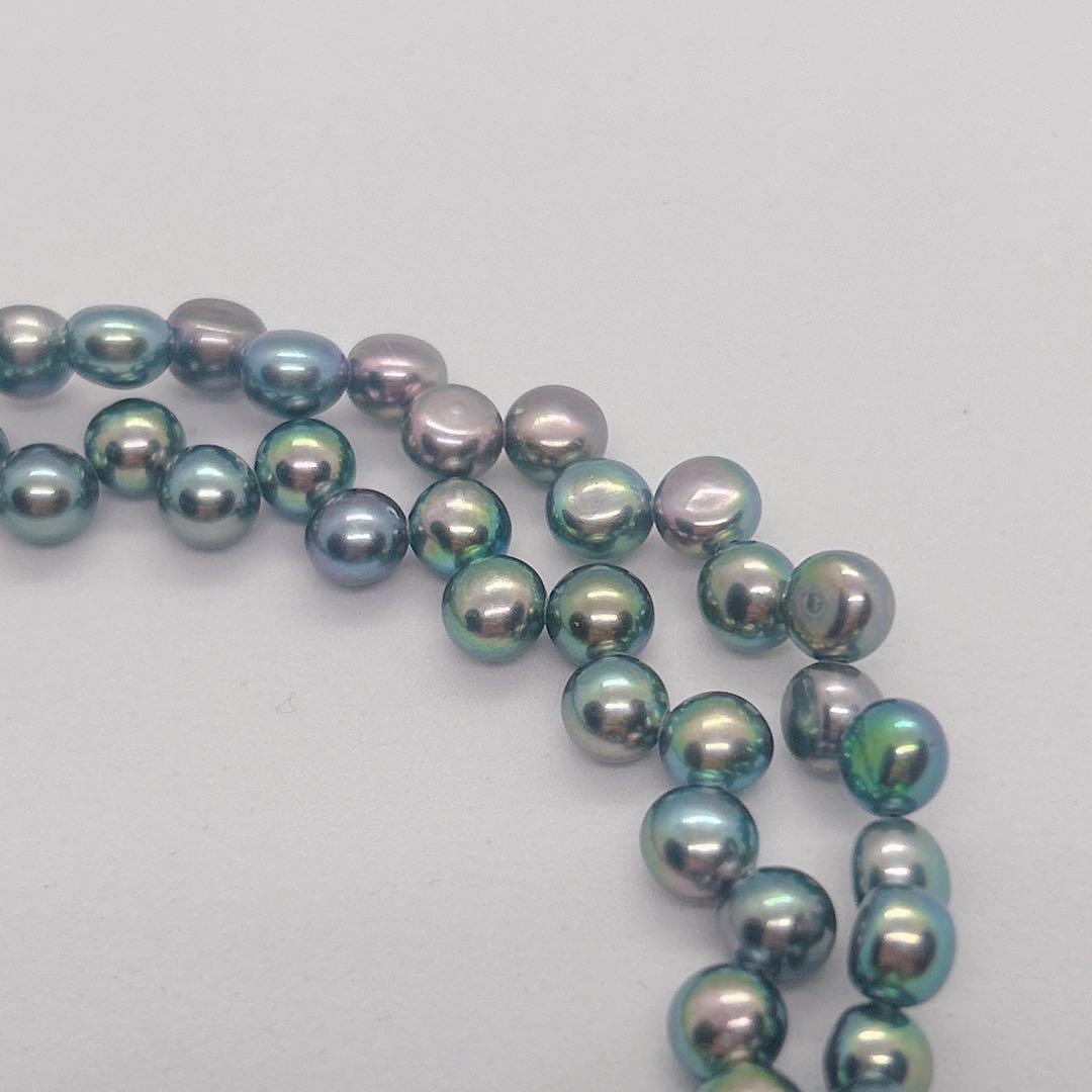 Pearl Necklace 64 featuring black aurora pearls and a K14 white gold clasp, 40cm length