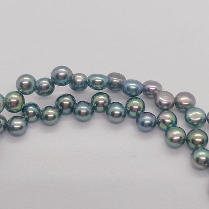 Pearl Necklace 64 featuring black aurora pearls and a K14 white gold clasp, 40cm length