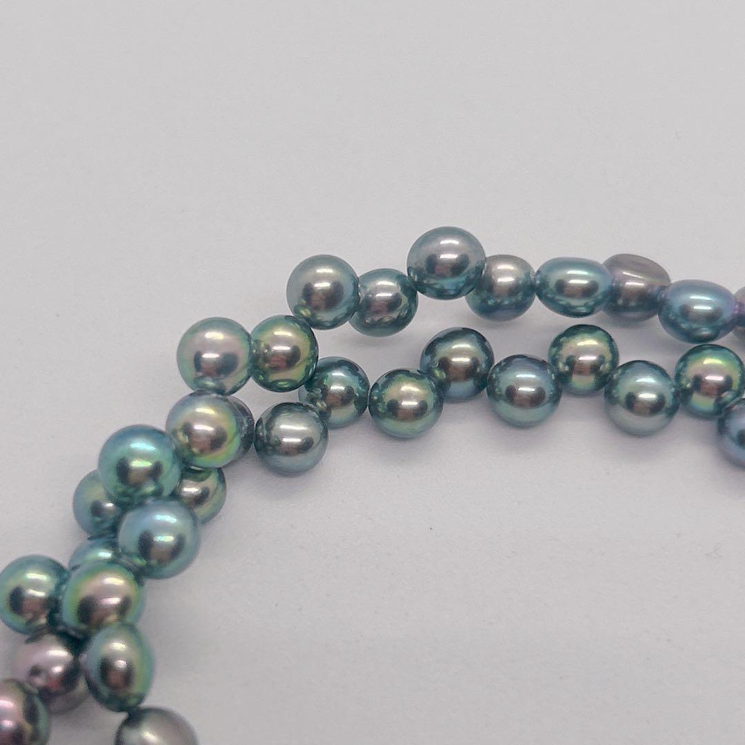 Pearl Necklace 64 featuring black aurora pearls and a K14 white gold clasp, 40cm length