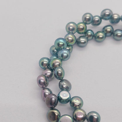 Pearl Necklace 64 featuring black aurora pearls and a K14 white gold clasp, 40cm length