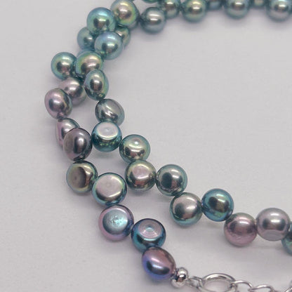 Pearl Necklace 64 featuring black aurora pearls and a K14 white gold clasp, 40cm length
