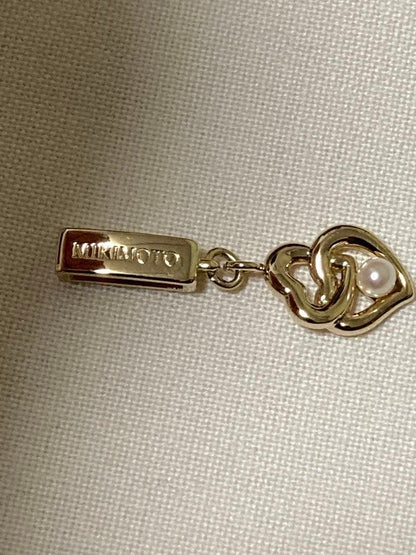 Mikimoto Baby Pearl Heart Pendant in silver with gold 3.5mm pearl, 31mm length, delicate heart shape
