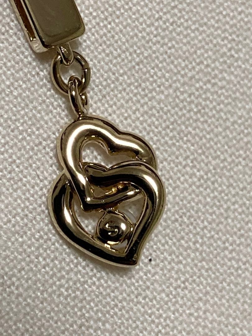 Mikimoto Baby Pearl Heart Pendant in silver with gold 3.5mm pearl, 31mm length, delicate heart shape