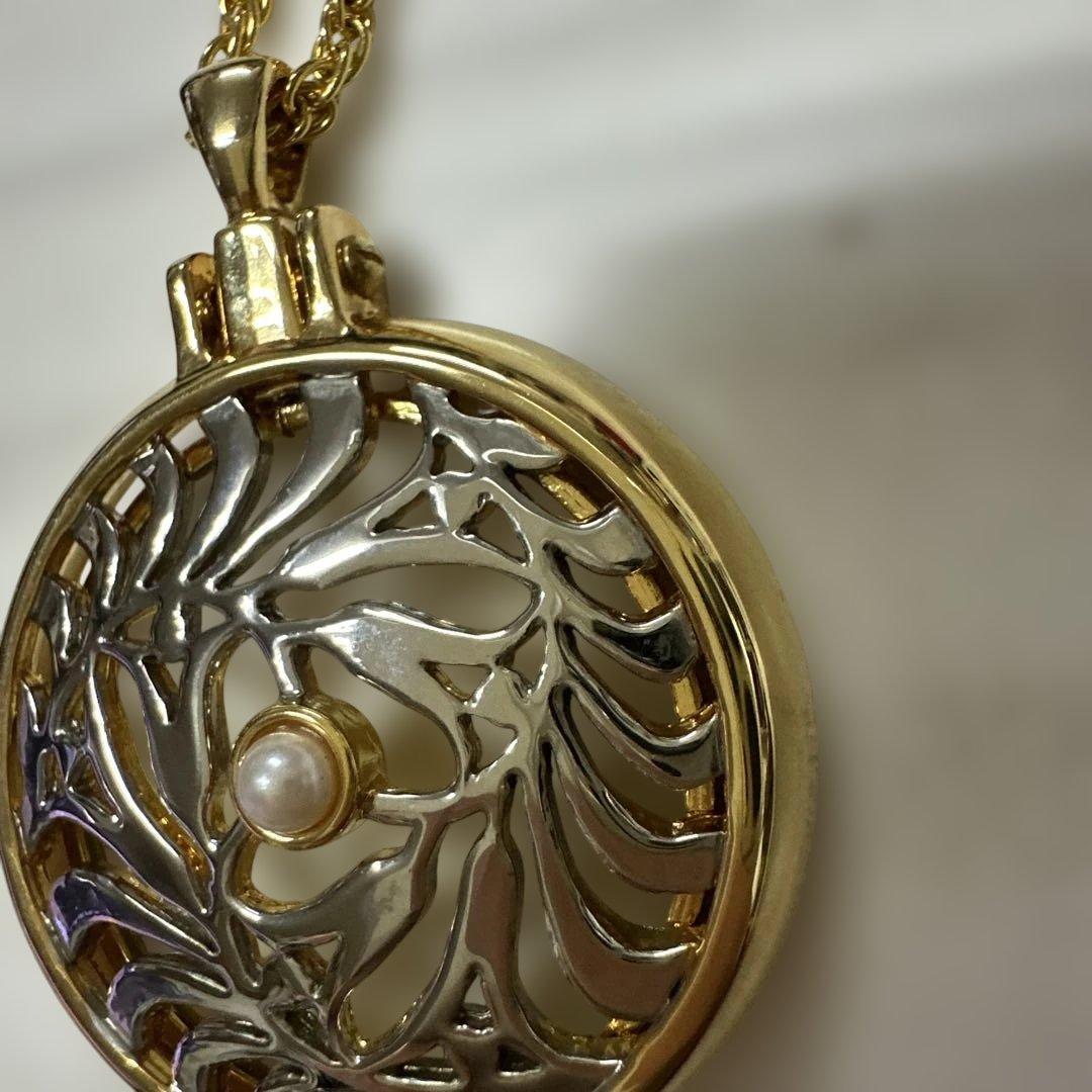 Mikimoto Pearl Loupe Necklace featuring a real pearl pendant on a delicate chain in used condition