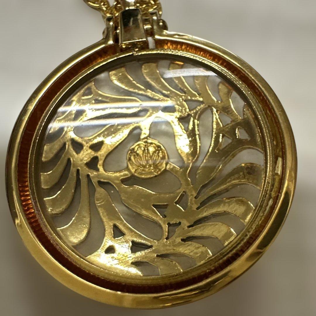 Mikimoto Pearl Loupe Necklace featuring a real pearl pendant on a delicate chain in used condition